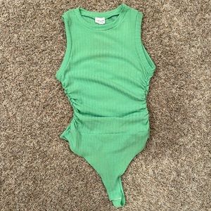 LELIS green bodysuit. NWT. Size small
